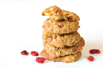 Cranberry oatmeal cookie on white background
