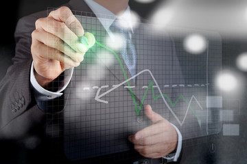 Double exposure of businessman hand working with new modern comp