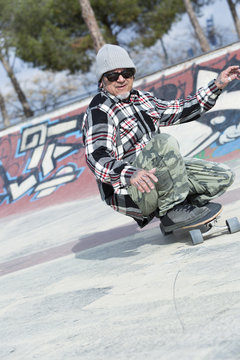 male skater skating crouched