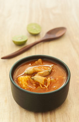 Spicy sour soup vegetable on wooden background