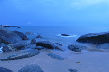 Fototapeta na wymiar view of the beach, stone and sea at night