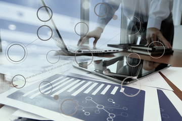 businessman hand working with business documents on office table