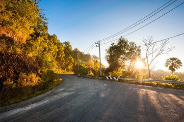 Fototapeta premium Mountain road at sunset