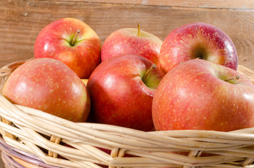 Tasty apples in a basket