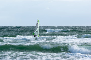 Windsurfer on a stormy sea