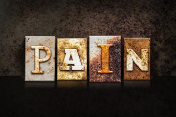 Pain Letterpress Concept on Dark Background