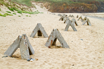 Concrete obstacles on the beach of Brittany, France, remainders of the Atlantic Wall