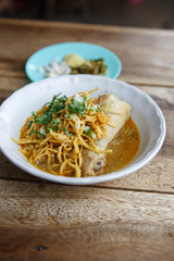curried chicken noodles soup famous food in North of Thailand