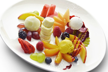 Dessert Plate of Cut Fruit Mixed with Ice Cream