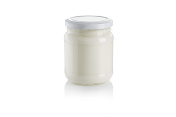 glass jar of yoghurt