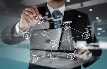 Double exposure of businessman working with new modern computer