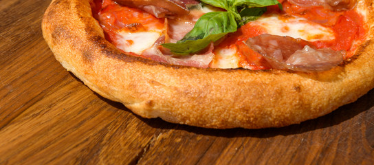 Fresh pizza on a thick dough
