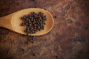Garlic and onion organic herbs and spices on wooden background