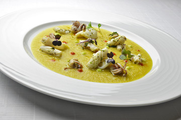 Fish Dish Cream of Jerusalem artichokes with saffron and squid w