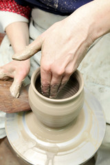 Modeling clay. Handmade pot. Painted glassware unique pattern