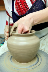 Modeling clay. Handmade pot. Painted glassware unique pattern