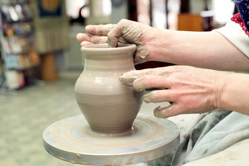 Modeling clay. Handmade pot. Painted glassware unique pattern