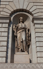 Fototapeta premium Wealth Statue (XIX c.) of Porta Venezia gates in Milan, Italy