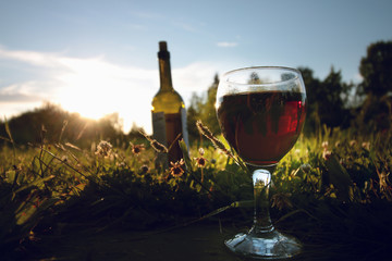 glass of wine at sunset