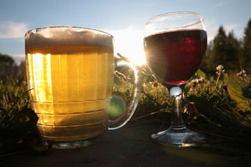 mug of beer at sunset