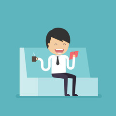 Businessman relax with coffee and book