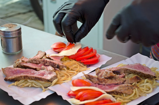 Chef preparing dish to take away