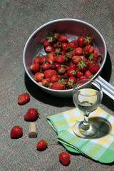 strawberries and a glass of white wine