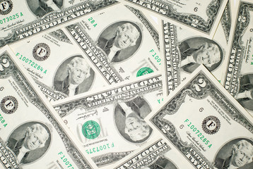 A lot of banknotes two US dollars