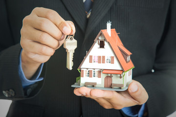 Businessman real estate show model house