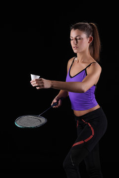 Woman With Badminton Racket Isolated On Black