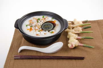 Traditional chinese century egg & pork porridge rice gruel serve