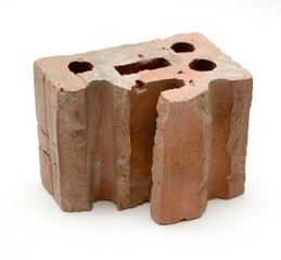 Fragment of brocken build brick isolated on white background