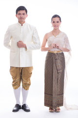 .Thai Man and women welcome with traditional Thai suit