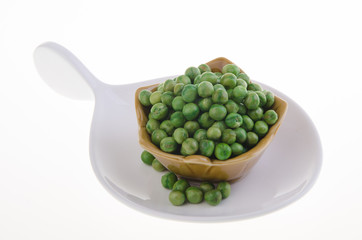 nuts or crispy coated green pea on the background.