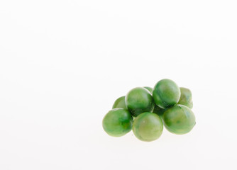 nuts or crispy coated green pea on the background.