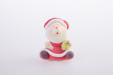 Santa Claus figurine on background