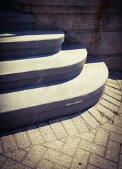 Sunlit stone stairs with shadow