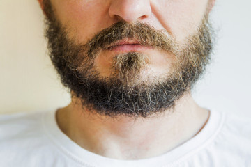 Obraz premium Close up of long bearded and mustache man, focus on beard