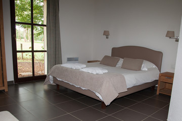 Interior of arranged double bed in a room