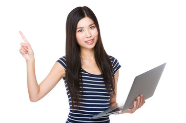 Woman hold with laptop computer and finger point up