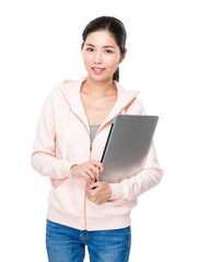 Asian woman hold with notebook computer