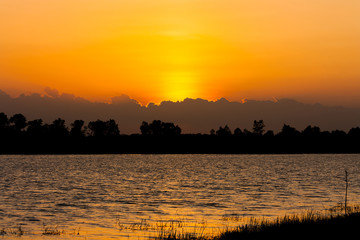 Obraz premium beautiful sunset on the river