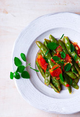 green beans, stewed with tomatoes.
