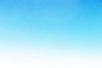Fantastic soft white clouds against blue sky under rain clouds