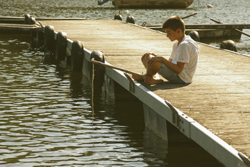 boy fishing in the river