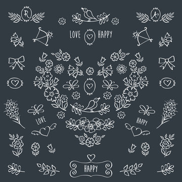 The set of hand drawn floral elements for Valentine's Day, mother's day, birthday, wedding. Vintage heart of flowers. Doodles, sketch. Hand drawn with chalk on the black chalkboard. Vector.