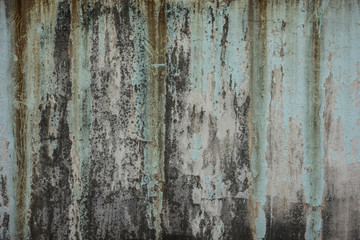dirty old green weathered painted wall as background