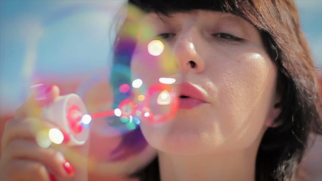 beautiful young woman blowing bubble outdoor happy lifestyle2