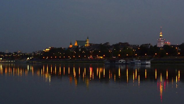 Night panorama of Warsaw Old Town and Vistula river, Poland