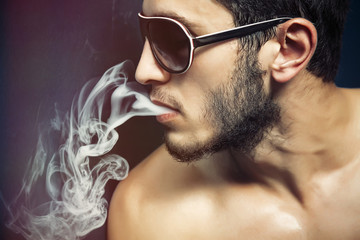 Smoker Muscular Man